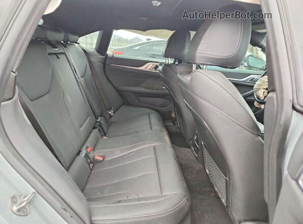WBY83FB00RFR86097 2024 BMW I4 Gray Vista de los asientos traseros
