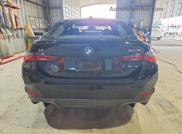 WBY83FB00RFS71577 2024 BMW I4 Black Вид ззаду