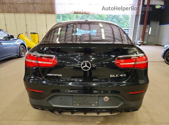 WDC0J6EB9KF495996 2019 MERCEDES-BENZ GLC-CLASS Black Front interior view