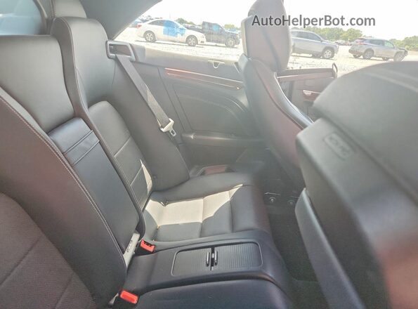 WDDKK6FF8GF332489 2016 MERCEDES-BENZ E Black Vista de los asientos traseros