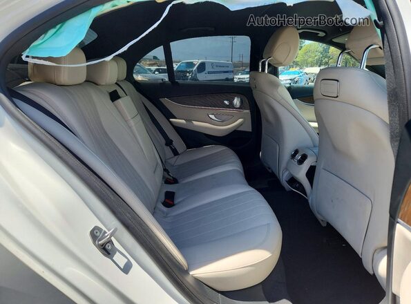 WDDZF4JB6JA347136 2018 MERCEDES-BENZ E White Vista de los asientos traseros