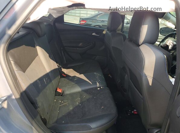WF0DP3TH2H4121873 2017 FORD FOCUS Gray Vista de los asientos traseros