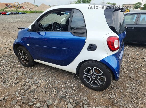 WMEFJ5DA4GK059818 2016 SMART FORTWO Blue Trasero izquierdo