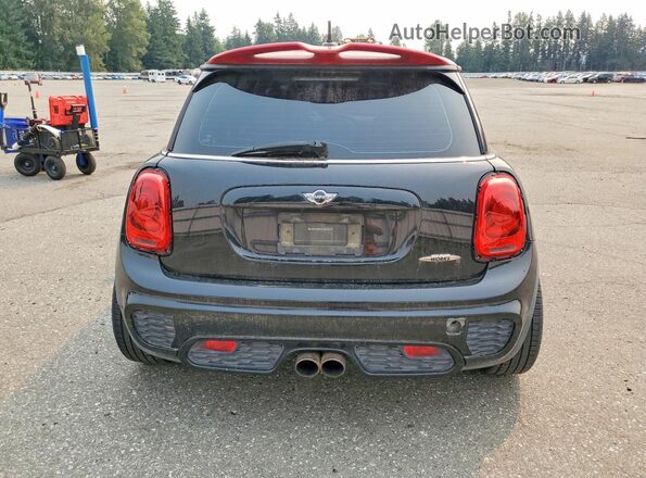 WMWXM9C5XHT997286 2017 MINI COOPER Black Հետևի տեսք
