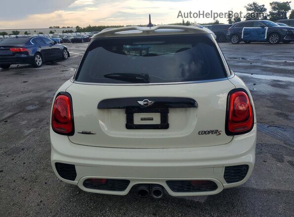WMWXU3C58H2D33185 2017 MINI COOPER White Rear view
