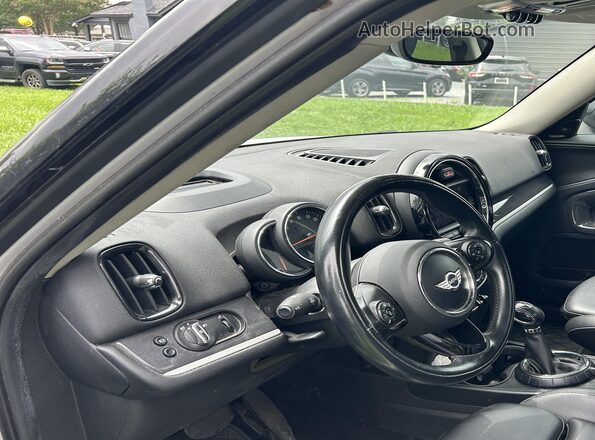 WMZYT5C32H3D81375 2017 MINI COUNTRYMAN  Vista interior delantera