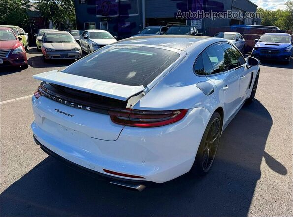 WP0AA2A71HL103883 2017 PORSCHE PANAMERA White Vista interior trasera