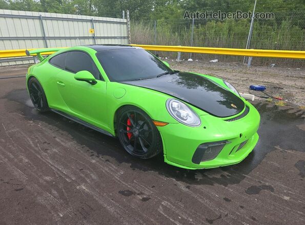 WP0AC2A95JS175760 2018 PORSCHE 911 Зеленый Передняя правая четверть
