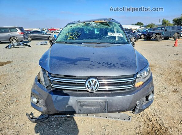 WVGAV7AX1GW560946 2016 VOLKSWAGEN TIGUAN Silver Widok z przodu