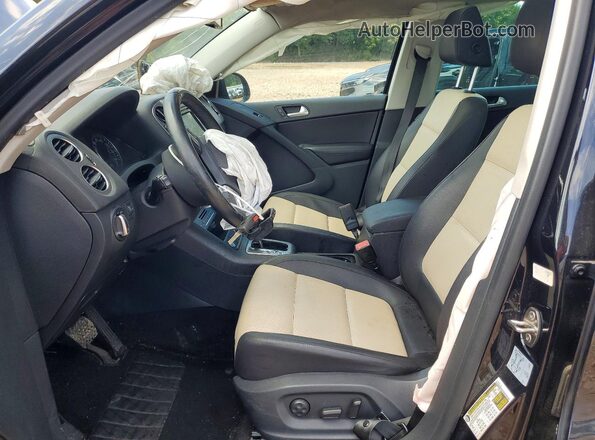 WVGAV7AX2GW553391 2016 VOLKSWAGEN TIGUAN Black Widok wnętrza z przodu