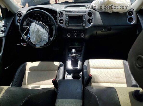 WVGAV7AX2GW553391 2016 VOLKSWAGEN TIGUAN Black Widok deski rozdzielczej