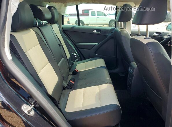 WVGAV7AX2GW553391 2016 VOLKSWAGEN TIGUAN Black Widok wnętrza z tyłu