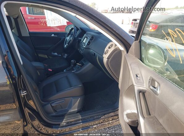 WVGAV7AX3GW541430 2016 VOLKSWAGEN TIGUAN Черный Вид салона спереди