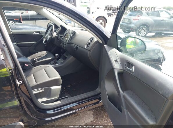 WVGAV7AX5GW580861 2016 VOLKSWAGEN TIGUAN Black წინა სალონის ხედი
