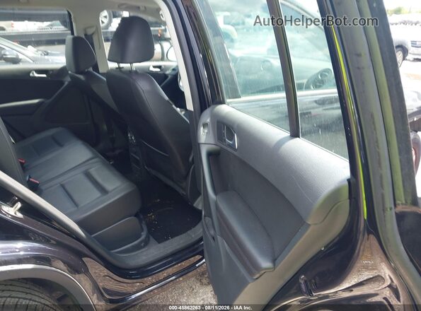 WVGAV7AX5GW580861 2016 VOLKSWAGEN TIGUAN Black VIN კოდის სტიკერის ხედი