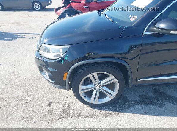 WVGAV7AX6GW519227 2016 VOLKSWAGEN TIGUAN Black Front view