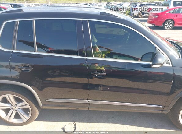 WVGAV7AX6GW519227 2016 VOLKSWAGEN TIGUAN Black Rear interior view