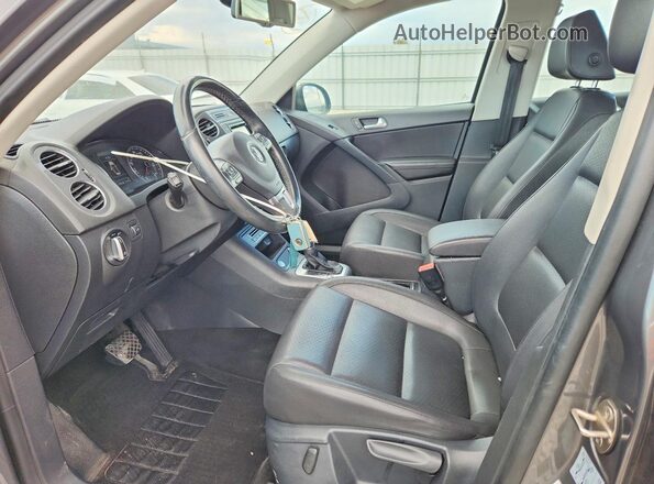 WVGAV7AX6GW593649 2016 VOLKSWAGEN TIGUAN Серый Вид салона спереди