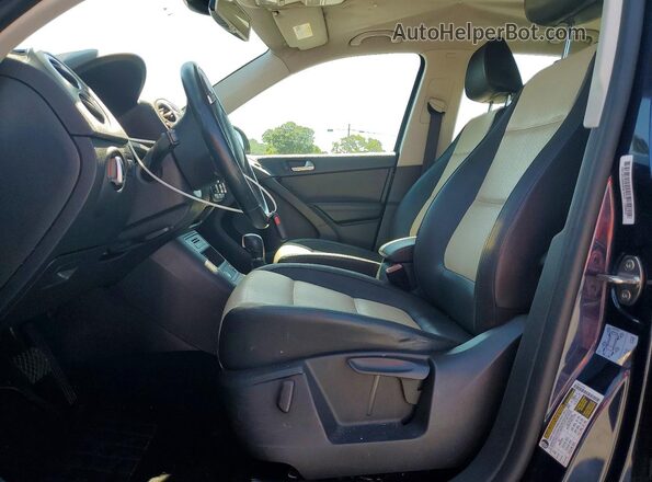 WVGAV7AX7GW586595 2016 VOLKSWAGEN TIGUAN Blue Widok wnętrza z przodu
