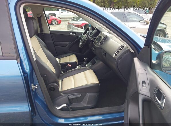 WVGAV7AX7HW511882 2017 VOLKSWAGEN TIGUAN Blue Widok wnętrza z przodu