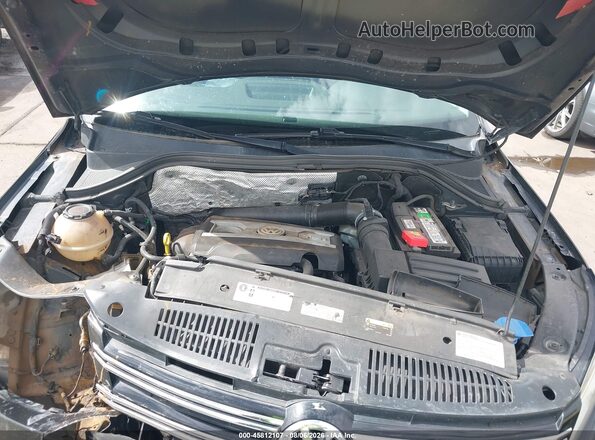 WVGAV7AX7JK004901 2018 VOLKSWAGEN TIGUAN Black უკანა ხედი