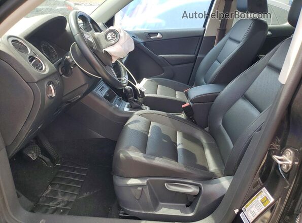 WVGAV7AX8GW519116 2016 VOLKSWAGEN TIGUAN Черный Вид салона спереди