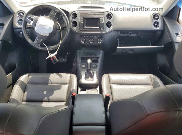 WVGAV7AX8GW519116 2016 VOLKSWAGEN TIGUAN Черный Вид панели приборов