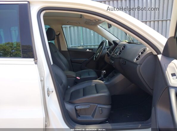 WVGAV7AX8GW564363 2016 VOLKSWAGEN TIGUAN White Vista interior delantera
