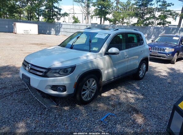 WVGAV7AX8GW564363 2016 VOLKSWAGEN TIGUAN White Vista tres cuartos delantera izquierda