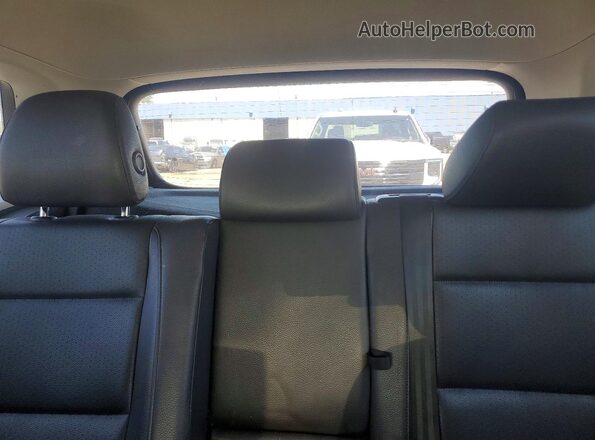 WVGBV7AX2GW557218 2016 VOLKSWAGEN TIGUAN White Vista de los asientos traseros