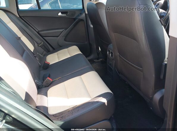 WVGBV7AX2GW582149 2016 VOLKSWAGEN TIGUAN Black Widok naklejki z numerem VIN