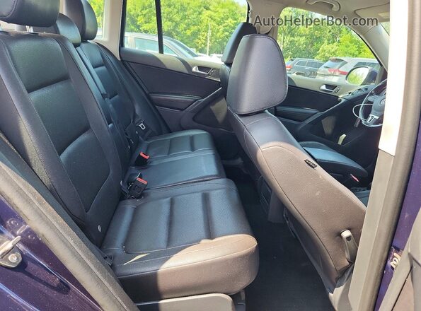 WVGBV7AX3GW577882 2016 VOLKSWAGEN TIGUAN Blue Rear interior view
