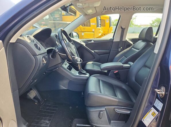 WVGBV7AX3GW577882 2016 VOLKSWAGEN TIGUAN Blue Front interior view