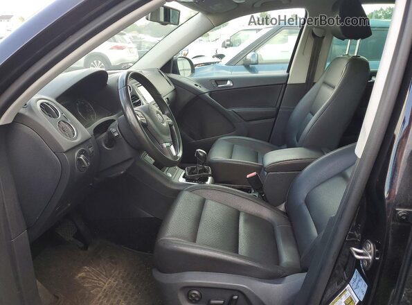 WVGBV7AX6GW588262 2016 VOLKSWAGEN TIGUAN Black Front interior view