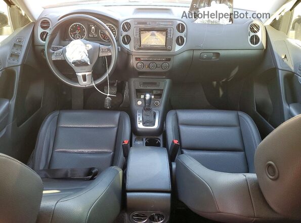 WVGJV7AX1GW606808 2016 VOLKSWAGEN TIGUAN Черный Вид панели приборов