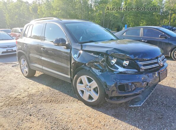 WVGJV7AX1GW606808 2016 VOLKSWAGEN TIGUAN Черный Передняя правая четверть