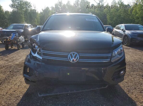 WVGJV7AX1GW606808 2016 VOLKSWAGEN TIGUAN Черный Вид спереди
