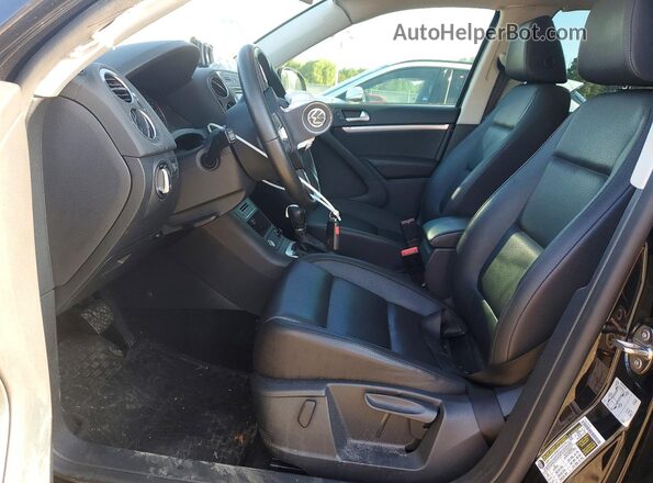 WVGJV7AX1GW606808 2016 VOLKSWAGEN TIGUAN Черный Вид салона спереди