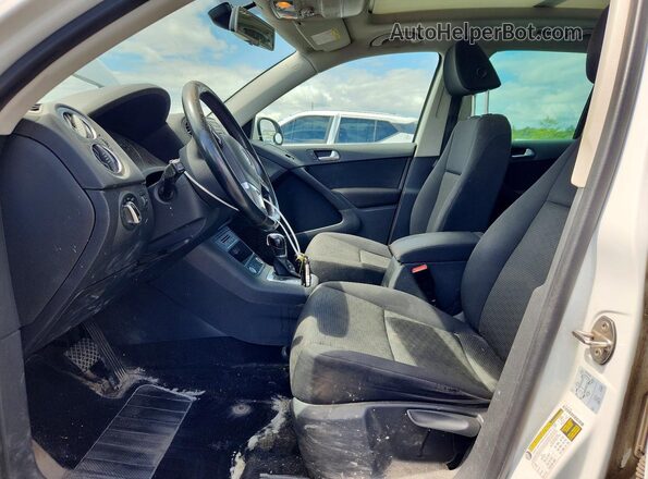 WVGJV7AX2GW594801 2016 VOLKSWAGEN TIGUAN White Vista interior delantera