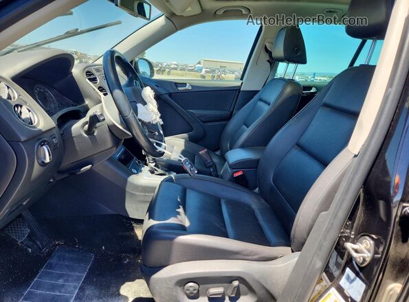 WVGRV7AX5HW501533 2017 VOLKSWAGEN TIGUAN Черный Вид салона спереди
