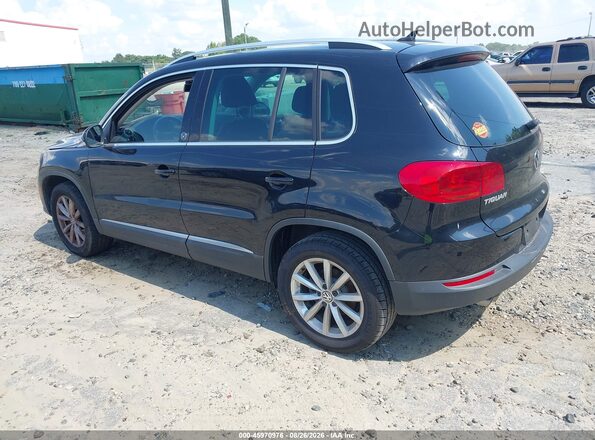 WVGRV7AX6HK009424 2017 VOLKSWAGEN TIGUAN Black Rear left