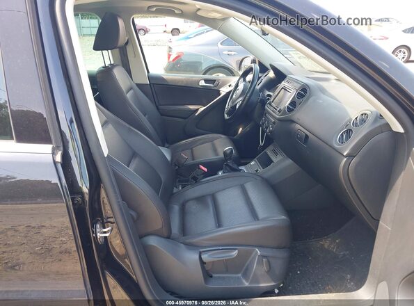 WVGRV7AX6HK009424 2017 VOLKSWAGEN TIGUAN Black Front interior view