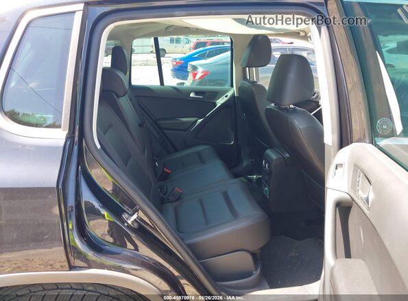 WVGRV7AX6HK009424 2017 VOLKSWAGEN TIGUAN Black VIN sticker view