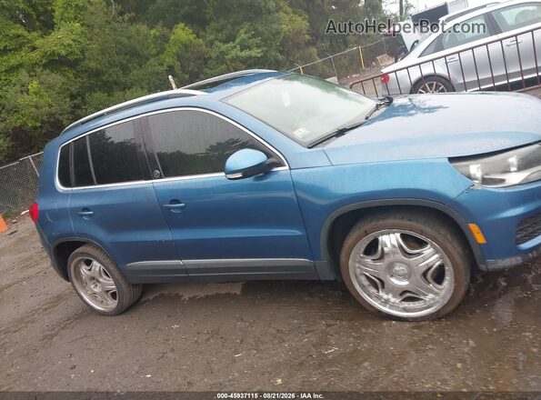 WVGSV7AX0HW509217 2017 VOLKSWAGEN TIGUAN Blue Vista interior trasera