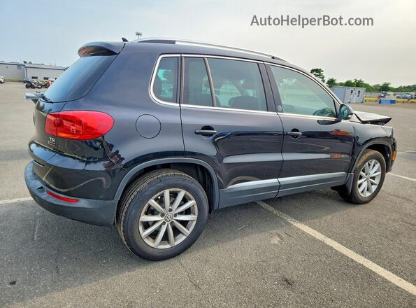 WVGSV7AX2HK005632 2017 VOLKSWAGEN TIGUAN Black Rear right