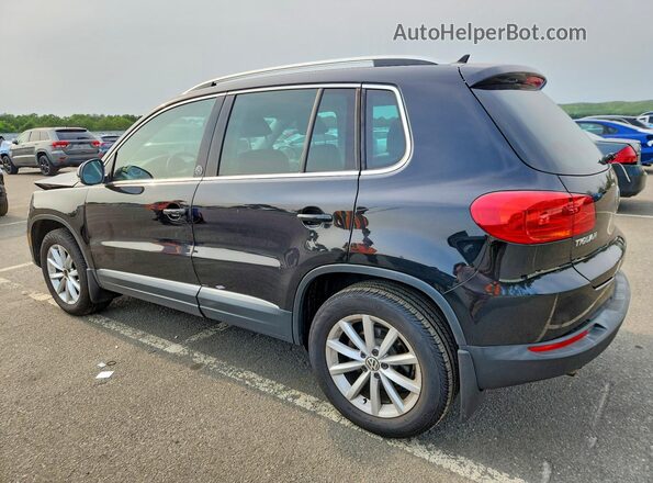 WVGSV7AX2HK005632 2017 VOLKSWAGEN TIGUAN Black Rear left