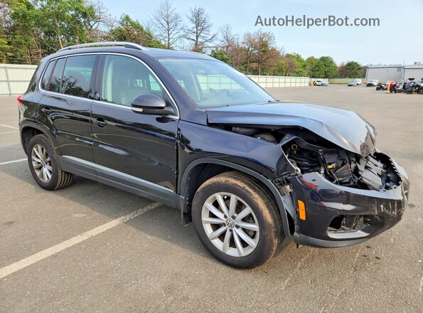 WVGSV7AX2HK005632 2017 VOLKSWAGEN TIGUAN Black Front right