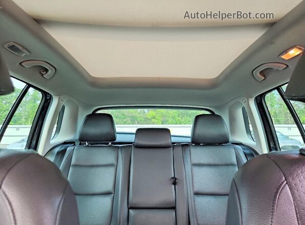 WVGSV7AX2HK005632 2017 VOLKSWAGEN TIGUAN Black Rear seats view