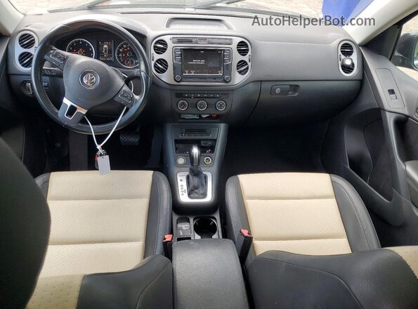 WVGSV7AX2HW500678 2017 VOLKSWAGEN TIGUAN Black Dashboard view
