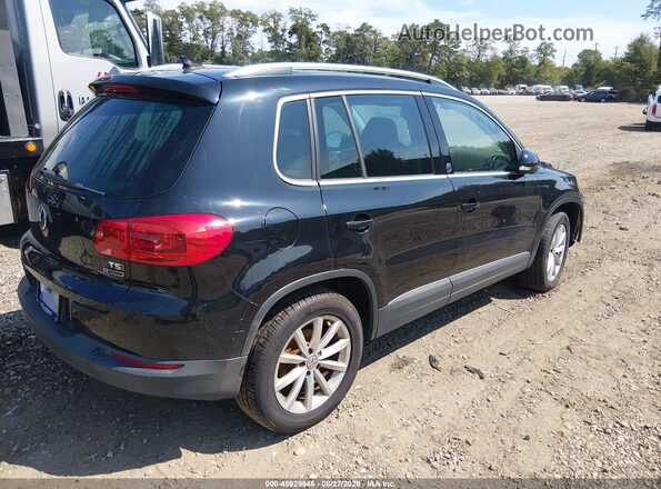 WVGSV7AX7HK015296 2017 VOLKSWAGEN TIGUAN Black Tył prawy